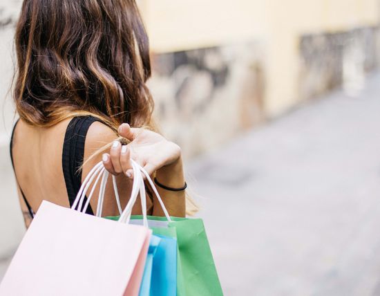 lady carrying shopping bags